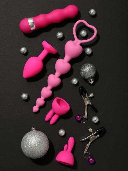 Sex,Toys,With,Christmas,Decorations,On,A,Dark,Background.
